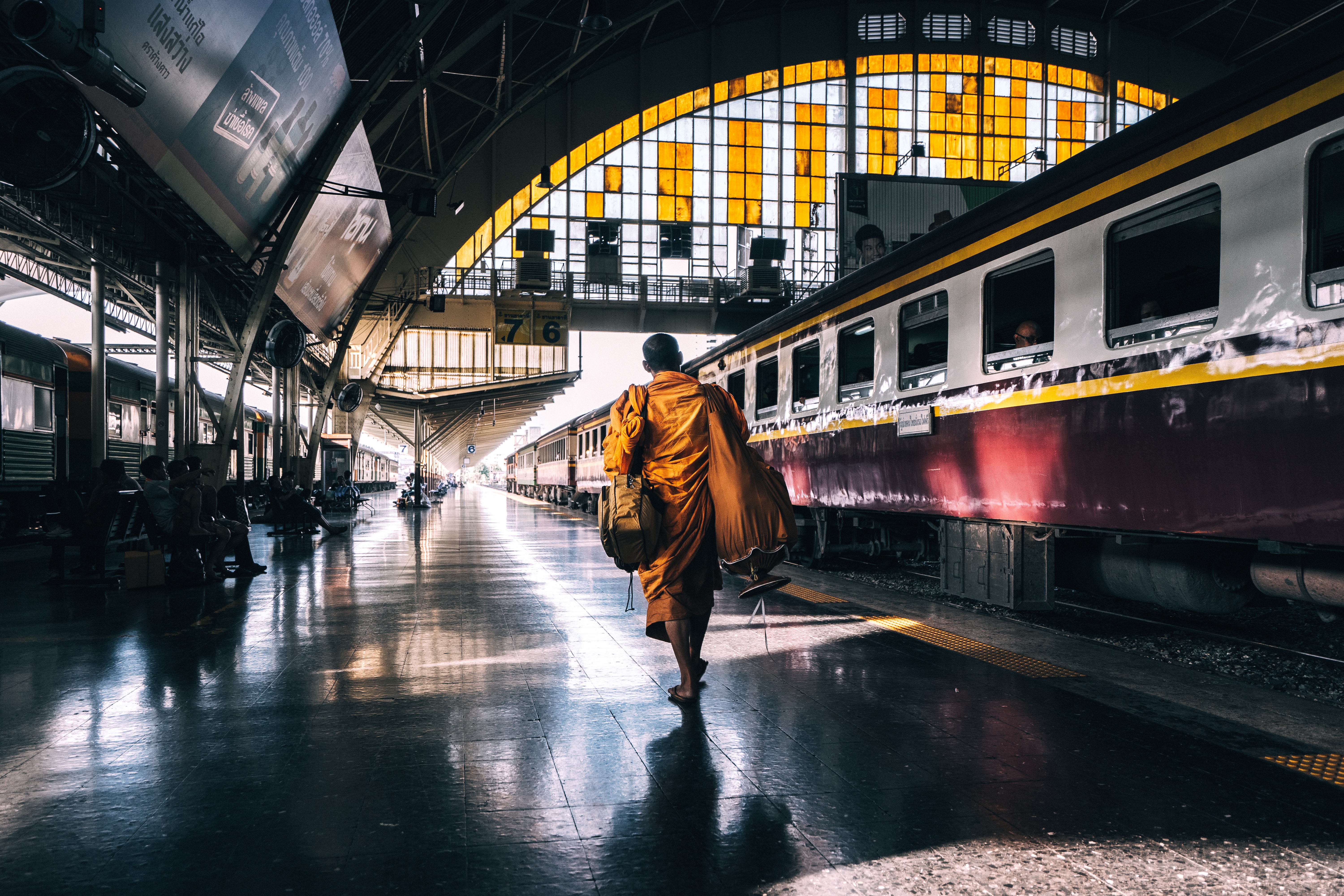 monk in train station